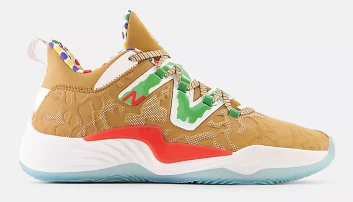 Side view of brown and green New Balance shoe.